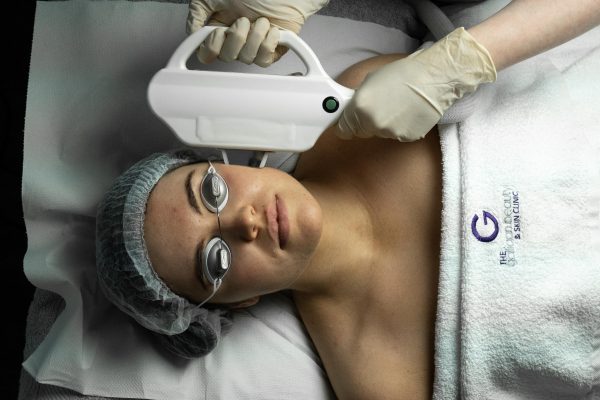 Image of student receiving Laser and Intense Pulsed Light treatments in Galligan College